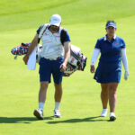 PARIS, FRANCE - AUGUST 06: Lilia Vu of Team United States walks on course with her caddie, Cole Pensanti during a practice round ahead of the Women's Individual Stroke Play on day eleven of the Olympic Games Paris 2024 at Le Golf National on August 06, 2024 in Paris, France. (Photo by Andrew Redington/Getty Images)