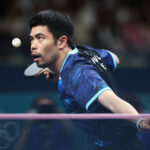 PARIS, FRANCE - AUGUST 06: Chih-Yuan Chuang of Team Chinese Taipei competes during the Table Tennis Men's Team Quarterfinal match against Tomokazu Harimoto of Team Japan day eleven of the Olympic Games Paris 2024 at South Paris Arena on August 06, 2024 in Paris, France. (Photo by Lintao Zhang/Getty Images)