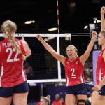 PARIS, FRANCE - AUGUST 06: Jordyn Poulter #2 of Team United States celebrates with teammates after winning a Women's Quarterfinals match against Team Poland on day eleven of the Olympic Games Paris 2024 at Paris Arena on August 06, 2024 in Paris, France. (Photo by Clive Brunskill/Getty Images)