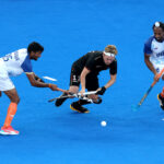 PARIS, FRANCE - AUGUST 06: Thies Prinz of Team Germany is challenged by Raj Kumar Pal of Team India during the Men's Semi Final match between Germany and India on day eleven of the Olympic Games Paris 2024 at Stade Yves Du Manoir on August 06, 2024 in Paris, France. (Photo by Lars Baron/Getty Images)