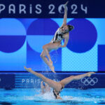 PARIS, FRANCE - AUGUST 06: Members of Team Japan compete in the Team Free Routine on day eleven of the Olympic Games Paris 2024 at Aquatics Centre on August 06, 2024 in Paris, France. (Photo by Clive Rose/Getty Images)