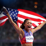 PARIS, FRANCE - AUGUST 06: Gabrielle Thomas of Team United States celebrates winning the gold medal after competing in the Women's 200m Final on day eleven of the Olympic Games Paris 2024 at Stade de France on August 06, 2024 in Paris, France. (Photo by Michael Steele/Getty Images)