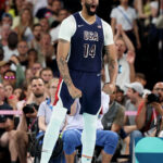 PARIS, FRANCE - AUGUST 06: Anthony Davis #14 of Team United States reacts after a dunk during a Men's basketball quarterfinal game between Team United States and Team Brazil on day eleven of the Olympic Games Paris 2024 at Bercy Arena on August 06, 2024 in Paris, France. (Photo by Jamie Squire/Getty Images)