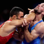 PARIS, FRANCE - AUGUST 07: Parviz Nasibov of Team Ukraine and Mate Nemes of Team Serbia compete during the Men’s Greco-Roman 67kg 1/8 Final match between Parviz Nasibov of Team Ukraine and Mate Nemes of Team Serbia on day twelve of the Olympic Games Paris 2024 at Champs-de-Mars Arena on August 07, 2024 in Paris, France. (Photo by Sarah Stier/Getty Images)