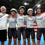 PARIS, FRANCE - AUGUST 07: Gold medalists Jennifer Valente, Lily Williams, Chloe Dygert and Kristen Faulkner of Team United States celebrate after the Women's Team Pursuit Finals on day twelve of the Olympic Games Paris 2024 at Saint-Quentin-en-Yvelines Velodrome on August 07, 2024 in Paris, France. (Photo by Jared C. Tilton/Getty Images)