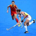 PARIS, FRANCE - AUGUST 07: Judith Vandermeiren of Team Belgium passes the ball during the Hockey Women's Semfinal match between Team Belgium and Team People's Republic of China on day twelve of the Olympic Games Paris 2024 at Stade Yves Du Manoir on August 07, 2024 in Paris, France. (Photo by Clive Brunskill/Getty Images)