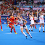 PARIS, FRANCE - AUGUST 07: Emma Puvrez of Team Belgium celebrates scoring her team's first goal during the Hockey Women's Semfinal match between Team Belgium and Team People's Republic of China on day twelve of the Olympic Games Paris 2024 at Stade Yves Du Manoir on August 07, 2024 in Paris, France. (Photo by Luke Hales/Getty Images)