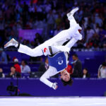 PARIS, FRANCE - AUGUST 07: Taejoon Park of Team Republic of Korea celebrates by performing a flip after winning during the Taekwondo Men's -58kg Gold medal match against Gashim Magomedov of Team Azerbaijan on day twelve of the Olympic Games Paris 2024 at Grand Palais on August 07, 2024 in Paris, France. (Photo by Alex Pantling/Getty Images)