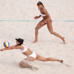 PARIS, FRANCE - AUGUST 07: Brandie Wilkerson of Team Canada bumps the ball during the Women's Quarterfinal match against Daniela Alvarez Mendoza and Tania Moreno Matveeva of Team Spain on day twelve of the Olympic Games Paris 2024 at Eiffel Tower Stadium on August 07, 2024 in Paris, France. (Photo by Julian Finney/Getty Images)