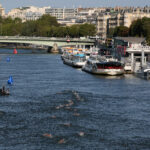 PARIS, FRANCE - AUGUST 08: A general view as athletes compete in the Marathon Swimming Women's 10k on day thirteen of the Olympic Games Paris 2024 at Pont Alexandre III on August 08, 2024 in Paris, France. (Photo by Clive Rose/Getty Images)