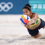 PARIS, FRANCE - AUGUST 08: Eduarda Santos Lisboa of Team Brazil attempts to dig the ball during the Women's Semifinal match against Mariafe Artacho del Solar and Taliqua Clancy of Team Australia on day thirteen of the Olympic Games Paris 2024 at Eiffel Tower Stadium on August 08, 2024 in Paris, France.  (Photo by Lars Baron/Getty Images)