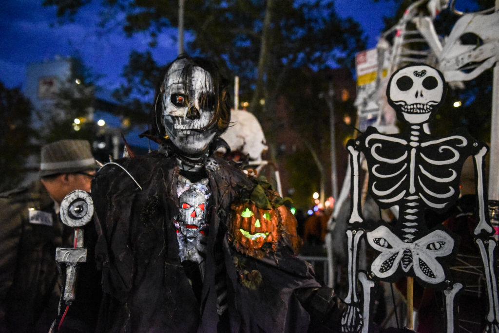 NEW YORK, NY - OCTOBER 31: People in costumes participate in the annual Village Halloween parade on...