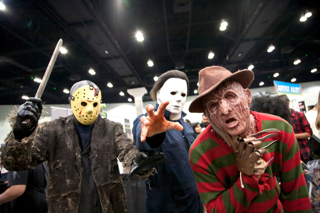 LOS ANGELES, CALIFORNIA - OCTOBER 12: Jason Voorhees, Michael Myers and Freddy Krueger cosplayers a...