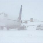 Snowstorm causing over 700 flight delays or cancellations at Denver airport today.